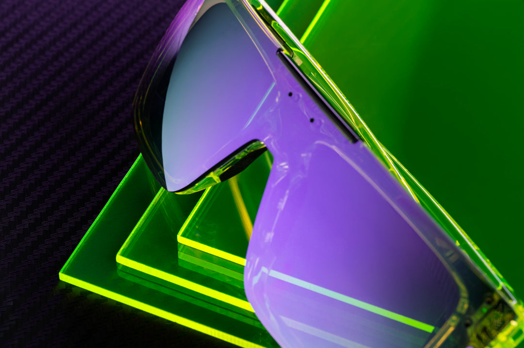 Close up shot of the Performance Quatro Sunglasses: Antifreeze Z87+ on a neon green platform