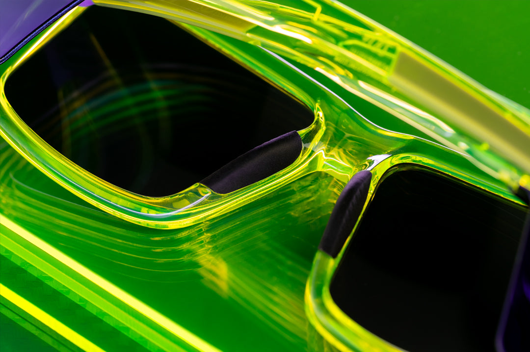 Close up shot of the Performance Vise Sunglasses: Antifreeze Z87+ on a neon green platform
