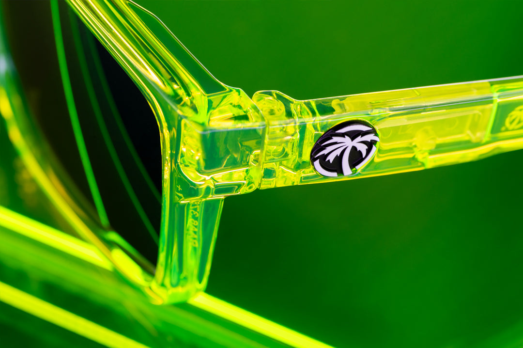 Close up shot of the Performance Vise Sunglasses: Antifreeze Z87+ on a neon green platform