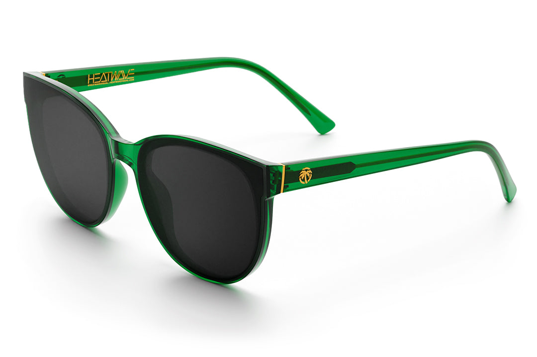 3/4 angle shot of the Carat Sunglasses: Cycad Green on a white background