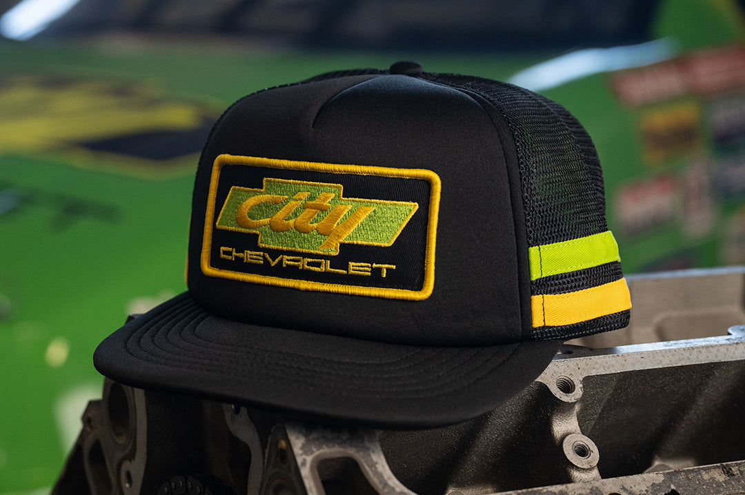 Sitting on an engine block is the City of Chevrolet x HWV Hat.