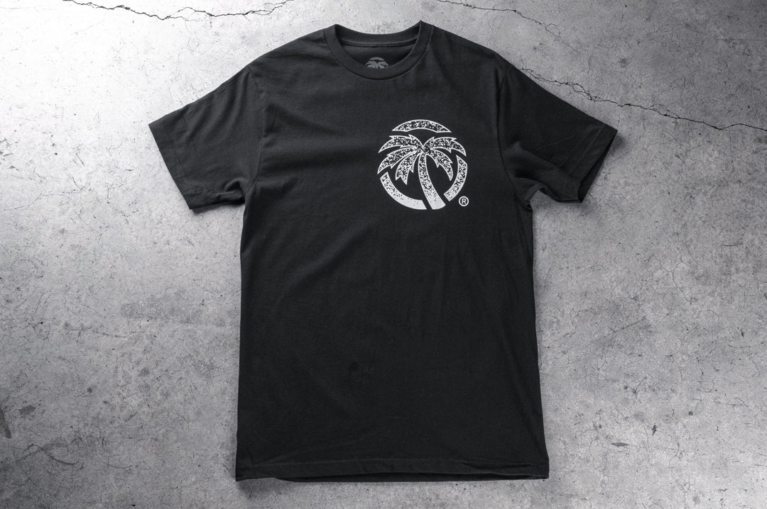Frontside shot of the Heat Wave Alloy T-Shirt on a concrete floor.