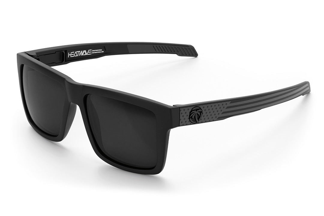 Heat Wave Visual Performance Vise Sunglasses with black frame, socom print arms and black lenses.