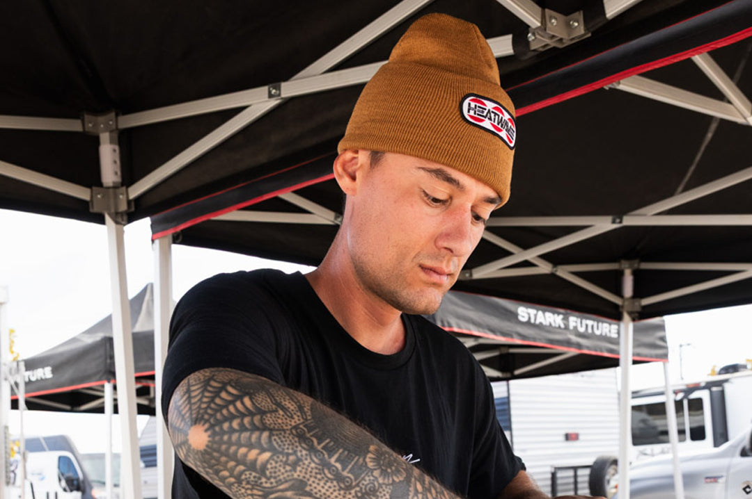 Young dude rocking the Heat Wave Visual Butterfly Oatmeal Beanie.