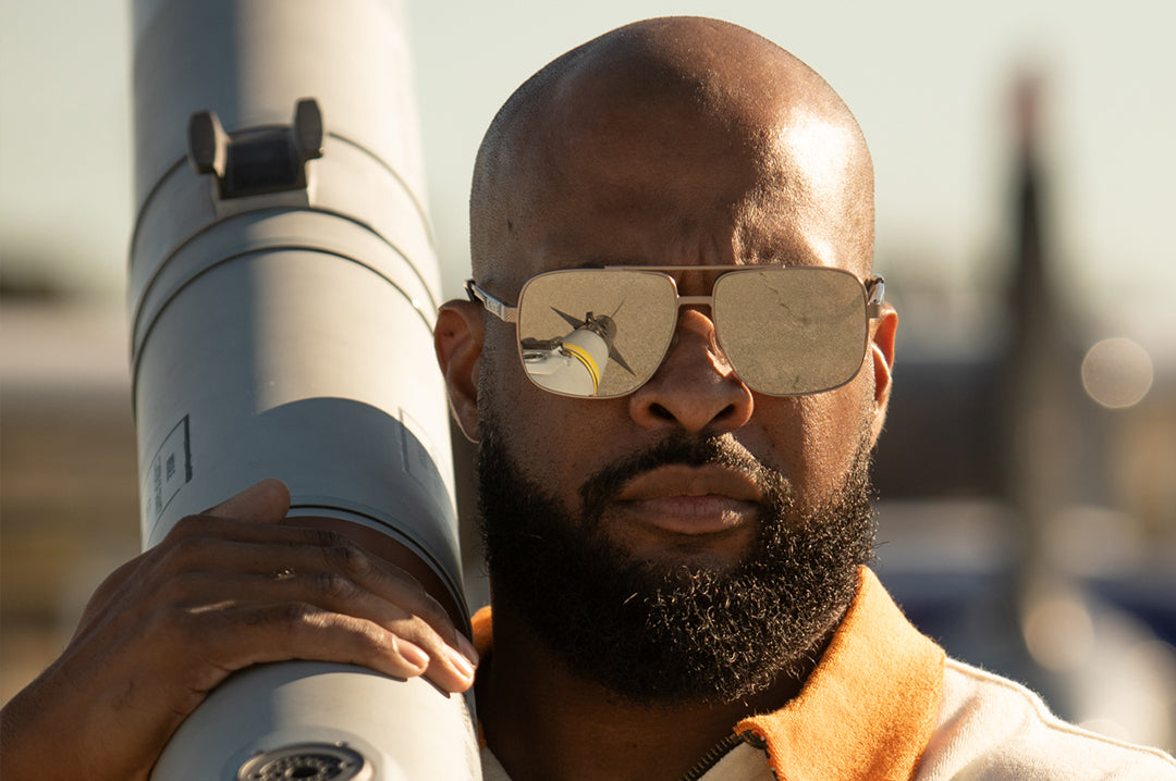 Ryan rocking the Heat Wave Visual Nimitz Sunglasses with gun metal frame and silver lenses.