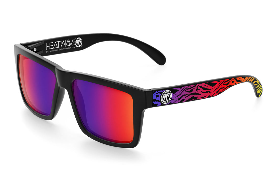Heat Wave Visual Vise Sunglasses with black frame, neo safari print arms and atmosphere red blue lenses.
