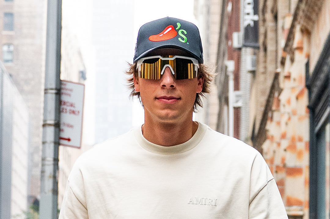 Man wearing Future Tech Sunglasses: GLOSS WHITE Gold Lens Z87+