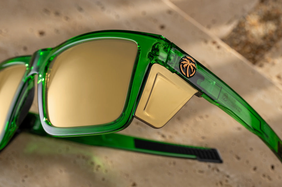 Close up shot of the Performance Vise Sunglasses: Cycad Green Z87+ with gold side shields