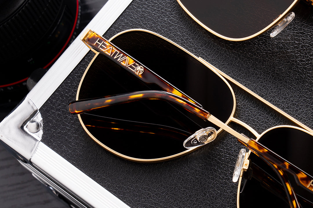 The backside of the Incline Sunglasses: Tortoise Brown Lens on a case