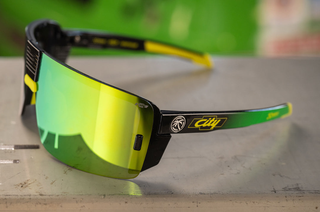 Sitting on a metal table is the City of Chevrolet x HWV Vector Sunglasses.