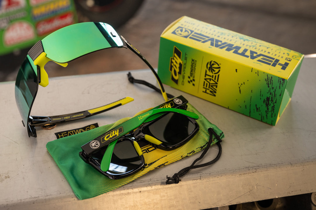 Lying on a metal table is the City of Chevrolet x HWV Sunglasses.