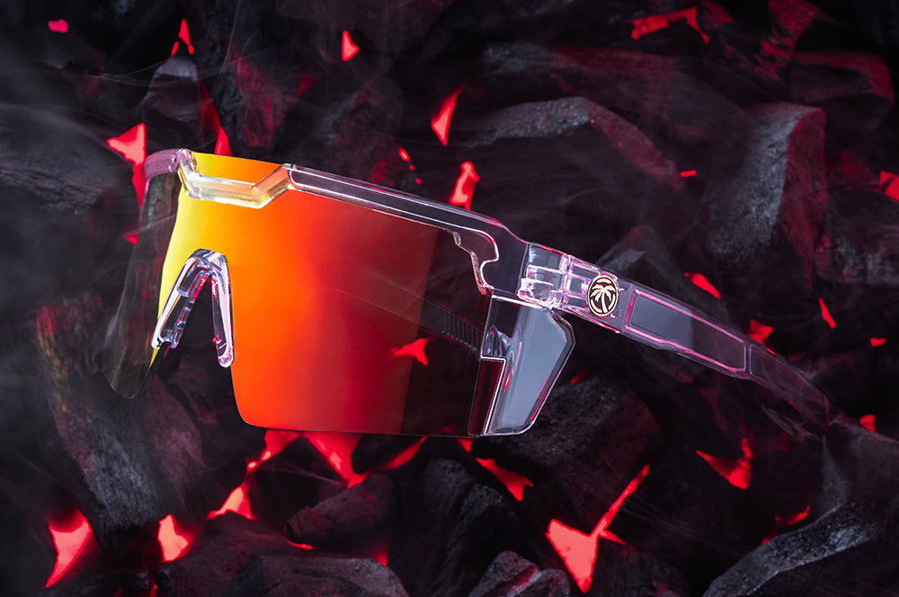 Side View of Heat Wave Future Tech Vapor Clear Sunblast safety sunglasses with hot bbq coals behind them.