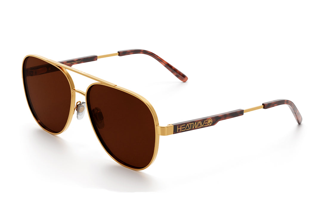 3/4 angle shot of the Incline Sunglasses: Tortoise Brown Lens on a white background