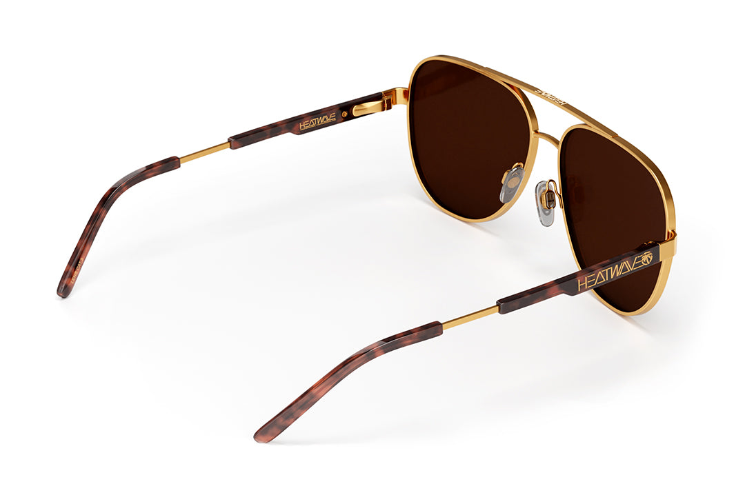 Back angle shot of the Incline Sunglasses: Tortoise Brown Lens on a white background