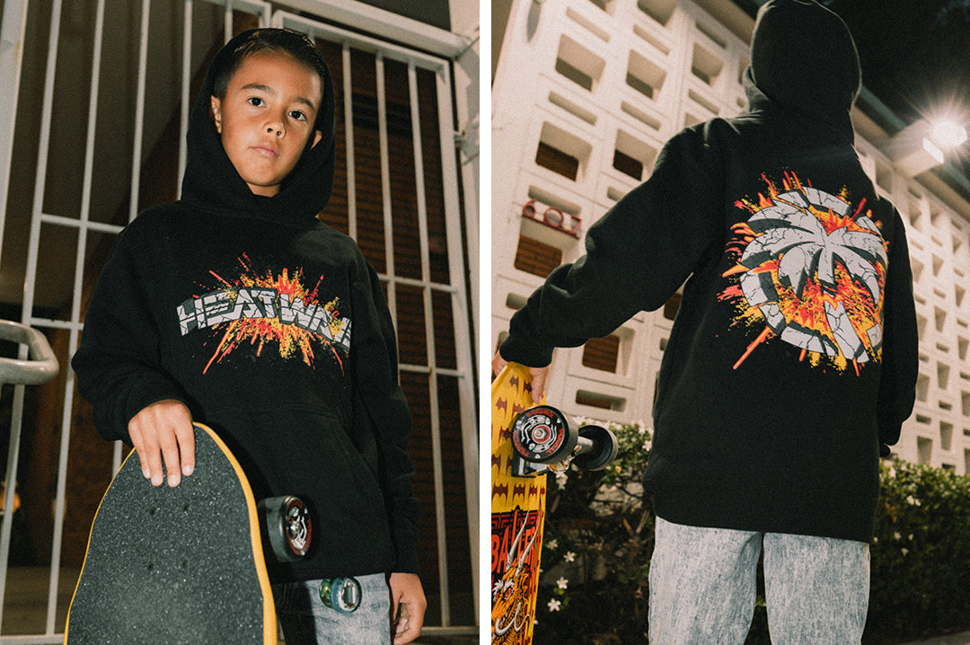Kid rocking the Heat Wave Visual Explosion Sweatshirt in black. 