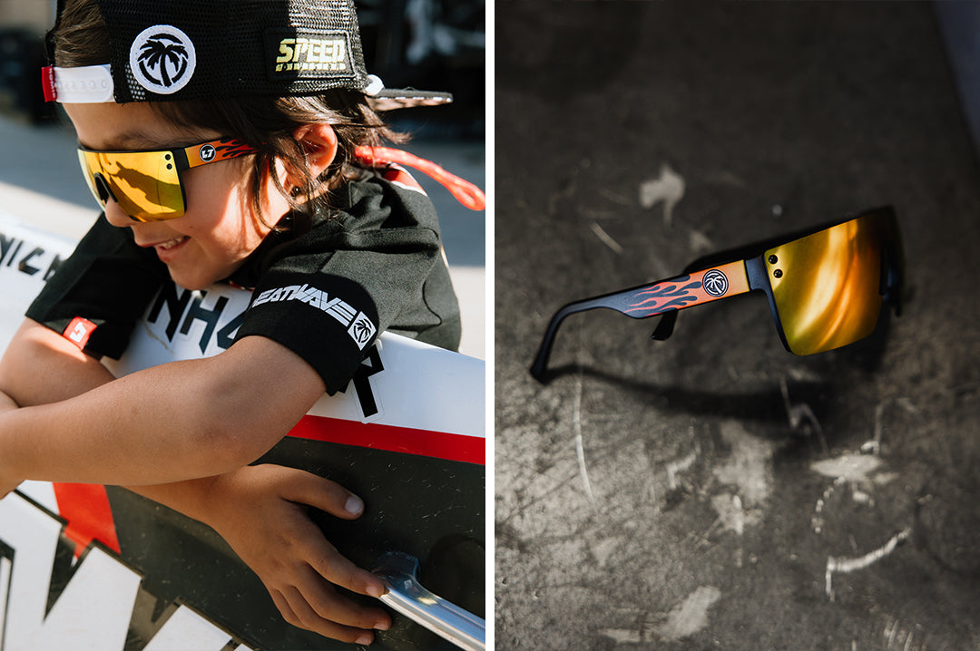Two photo collage of a young boy wearing the Kids Lazer Face Sunglasses: Little Trouble X Heat Wave Flames with red-orange gradient lens, and a side angled shot of the glasses on a concrete floor.