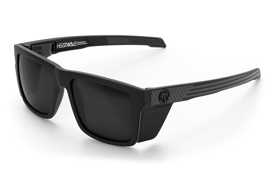 Heat Wave Visual Performance Vise Sunglasses with black frame, socom print arms, black lenses and matching side shields.