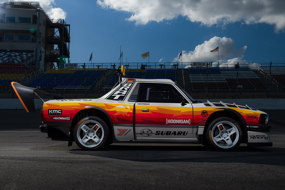 The Brataroo 9500 at a race track with the Heat Wave Visual graphics. 