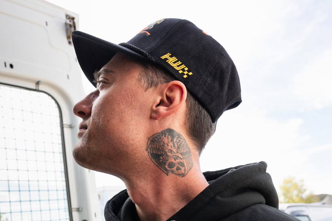 Ryan Ritter rocking the Heat Wave Visual Black Magic Black Cord Hat.