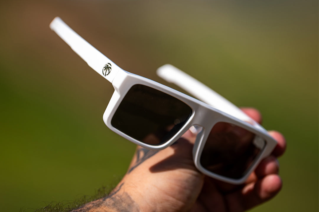 Colby Raha holding The Performance Rayth Sunglasses: Colby Raha 2.0 