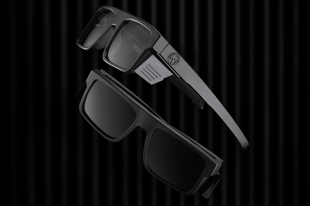 Lying on the floor is the Heat Wave Visual Performance Rayth Super Photochromic Sunglasses.