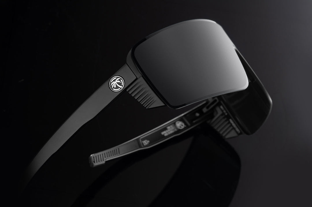 Side profile shot of the Skynet Sunglasses: Silver Z87+ on a black background