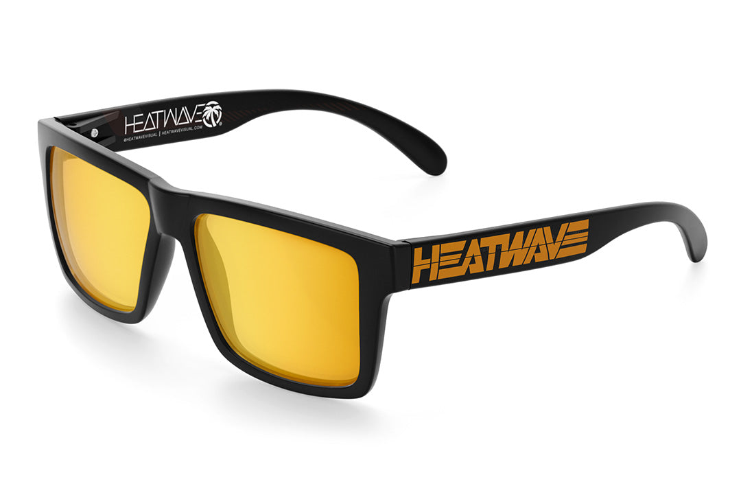 Heat Wave Visual Vise Sunglasses with black frame, gold billboard print arms and gold lenses.