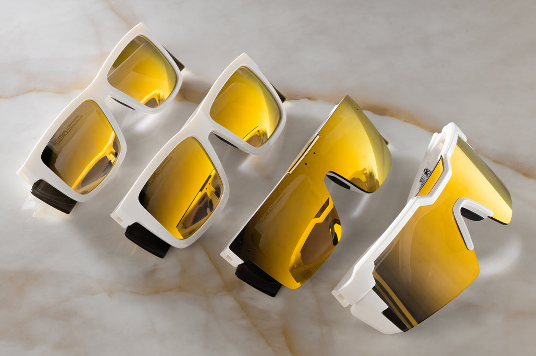 All four pairs of the GLOSS WHITE collection lined up in a row on a counter