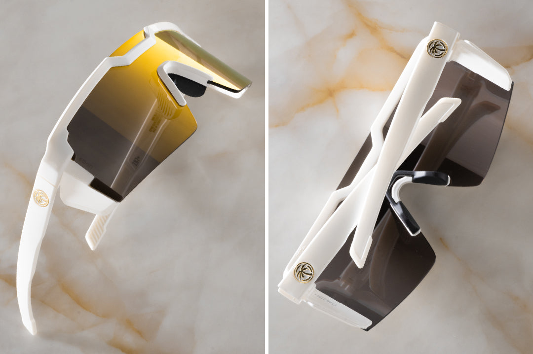 Two images of the Future Tech Sunglasses: GLOSS WHITE Gold Lens Z87+ on a counter