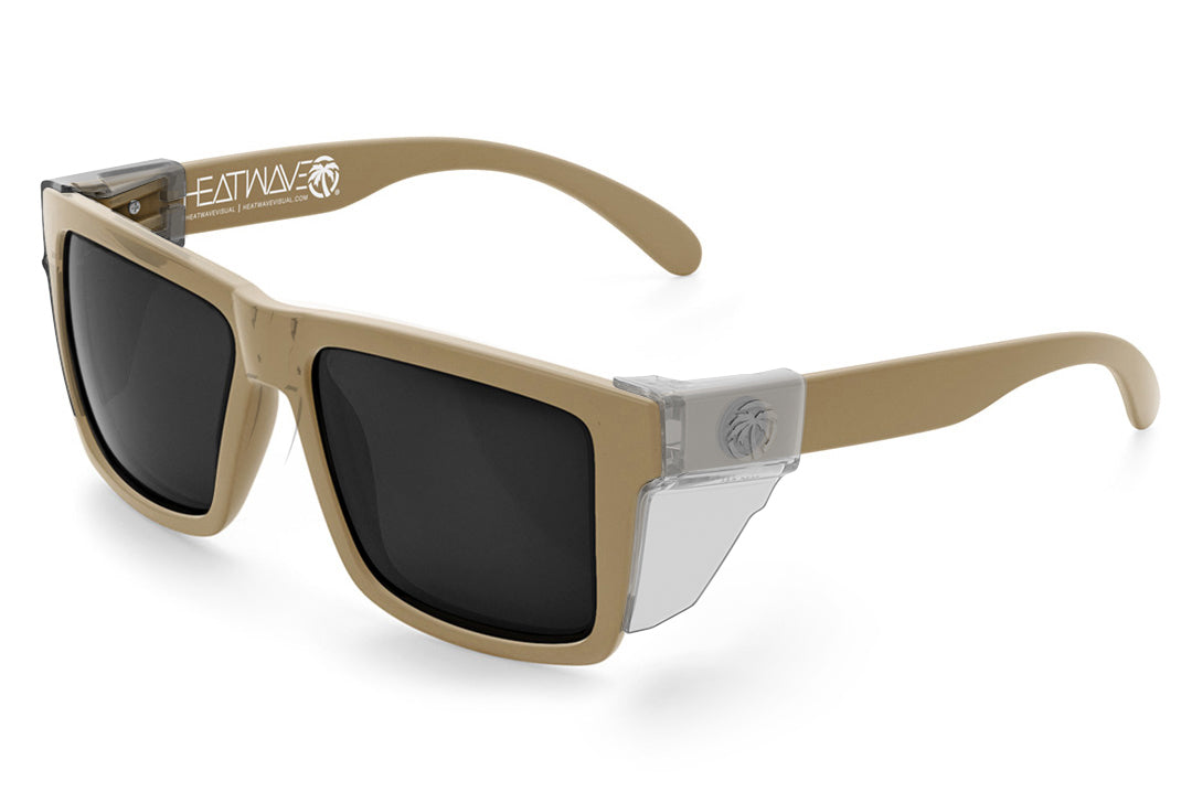 3/4 angle of the XL VISE Z87 Sunglasses DESERT TAN: Black on a white background with clear side shields