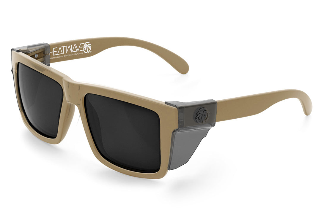 3/4 angle of the XL VISE Z87 Sunglasses DESERT TAN: Black on a white background with smoke side shields