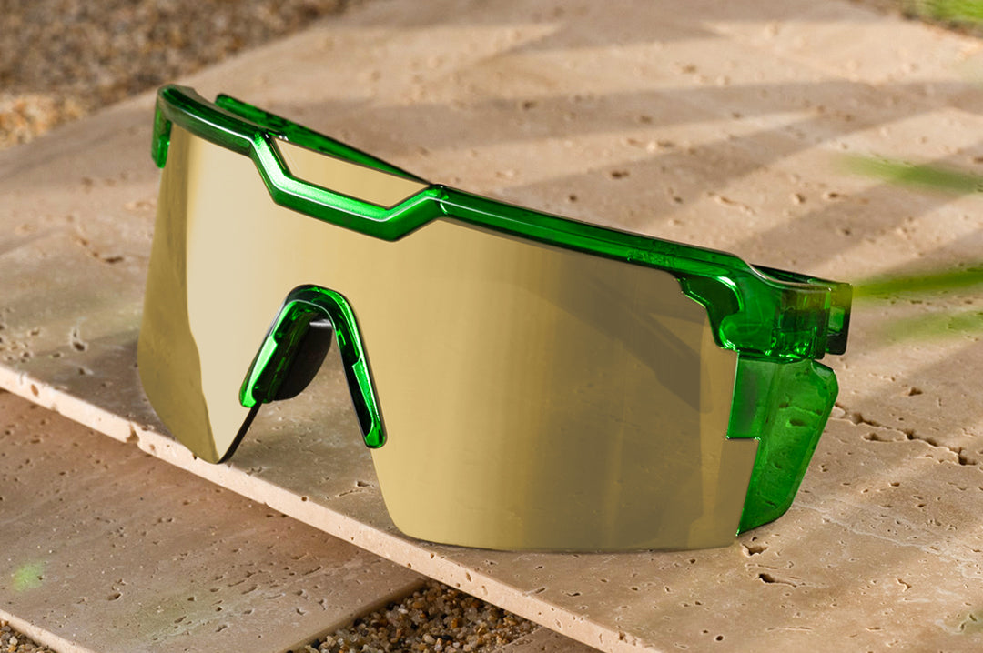 the Future Tech Sunglasses: Cycad Green Z87+ on concrete