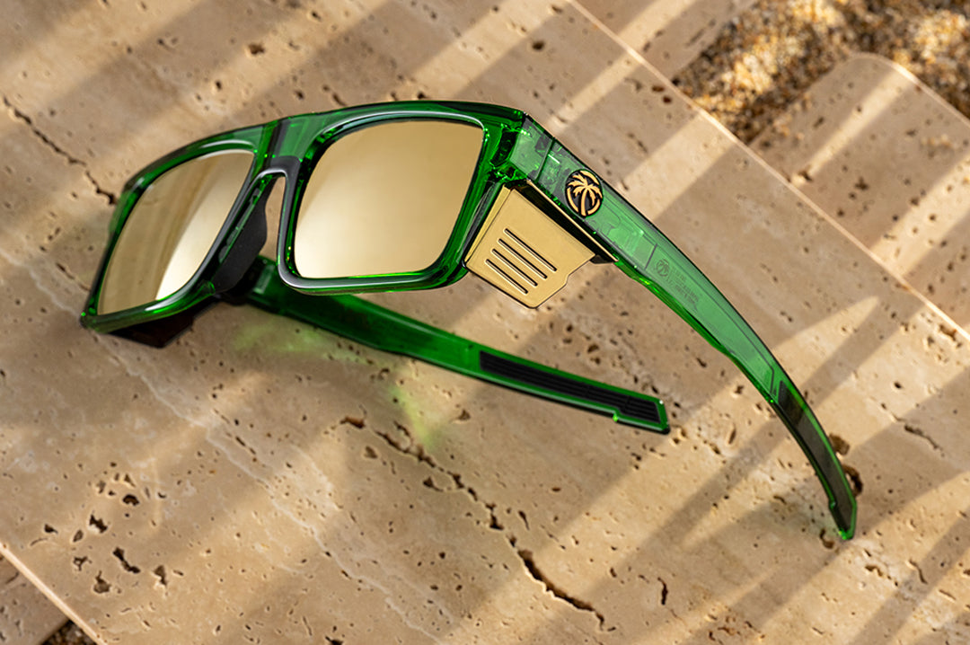 The Performance Rayth Sunglasses: Cycad Green Z87+ on concrete