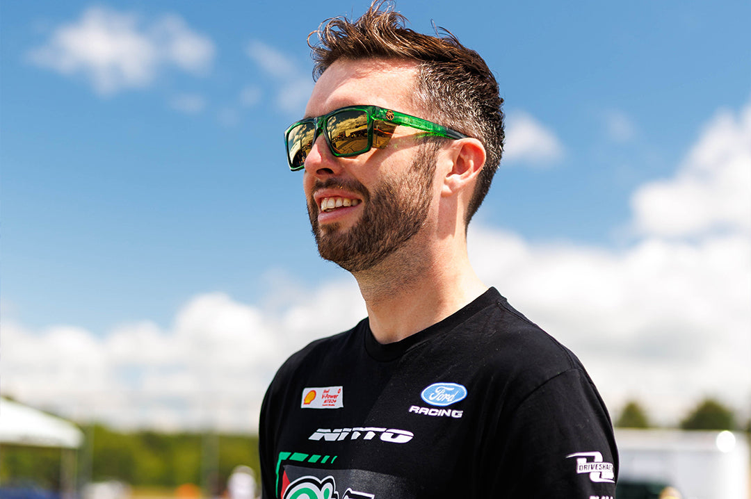 Man wearing the Performance Rayth Sunglasses: Cycad Green Z87+
