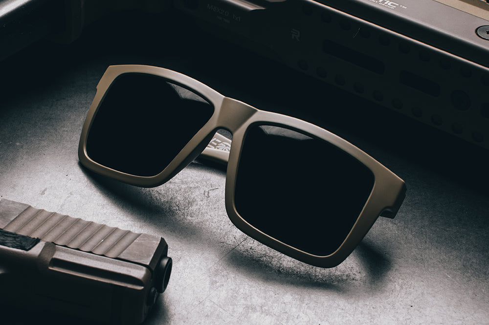 Close up of front of Heat Wave XL Vise tan sunglasses with ultra black lenses.