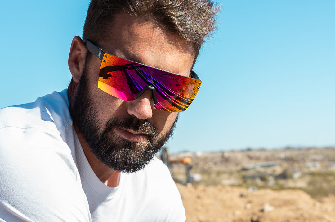Tradesman wearing the Heat Wave Visual Lazer Face Sunglasses with black frame and atmosphere lens. 