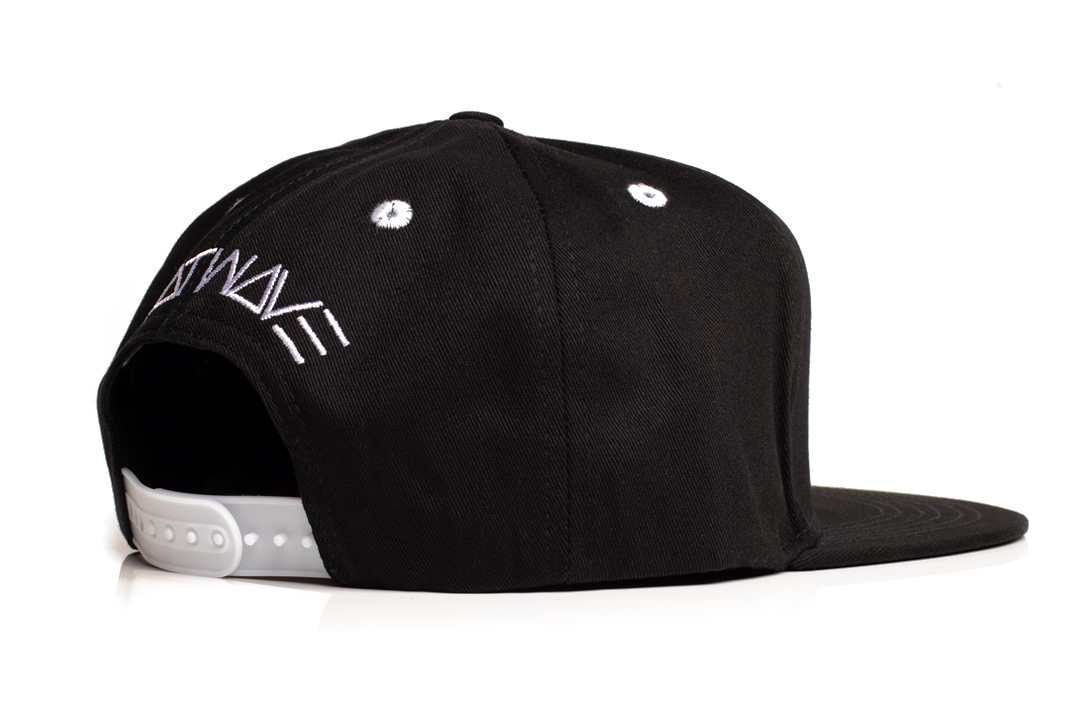 Back of Heat Wave Visual black snapback hat with USA icon patch.