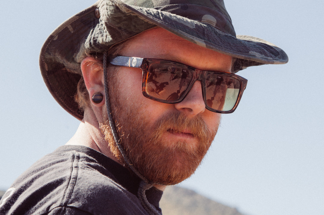 Chris Isenhouer wearing Heat Wave Visual Tortoise Vise Sunglasses.